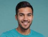 ai generated a cheerful man in a turquoise shirt gives a thumbs up with a confident and relaxed expression photo e1752095181934